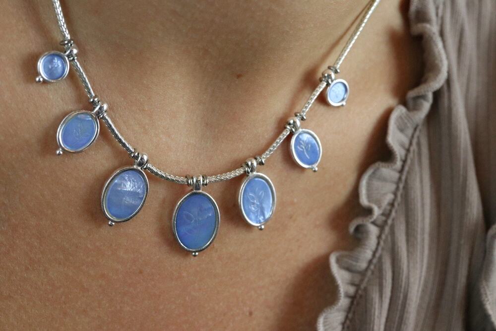 Carolina Herrera Silver Graduated Blue Mother of Pearl Carved Leaf Necklace